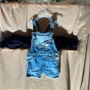 Girls blue Jean short overalls. Worn only a few times.